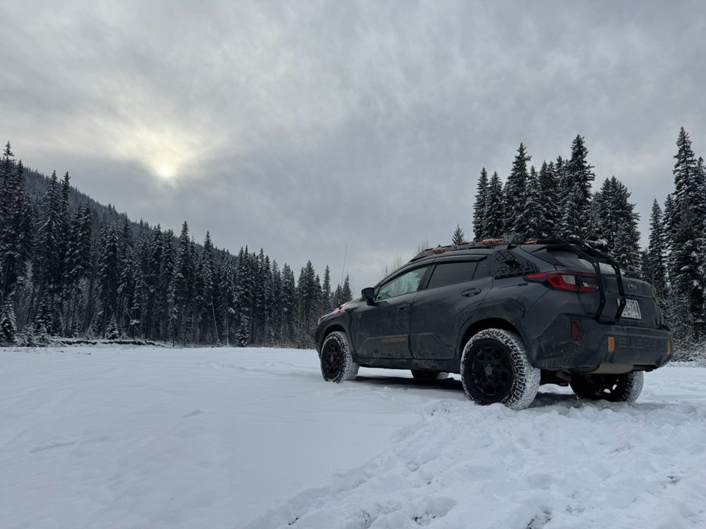 Crosstrek in a snowy Cascade clearing