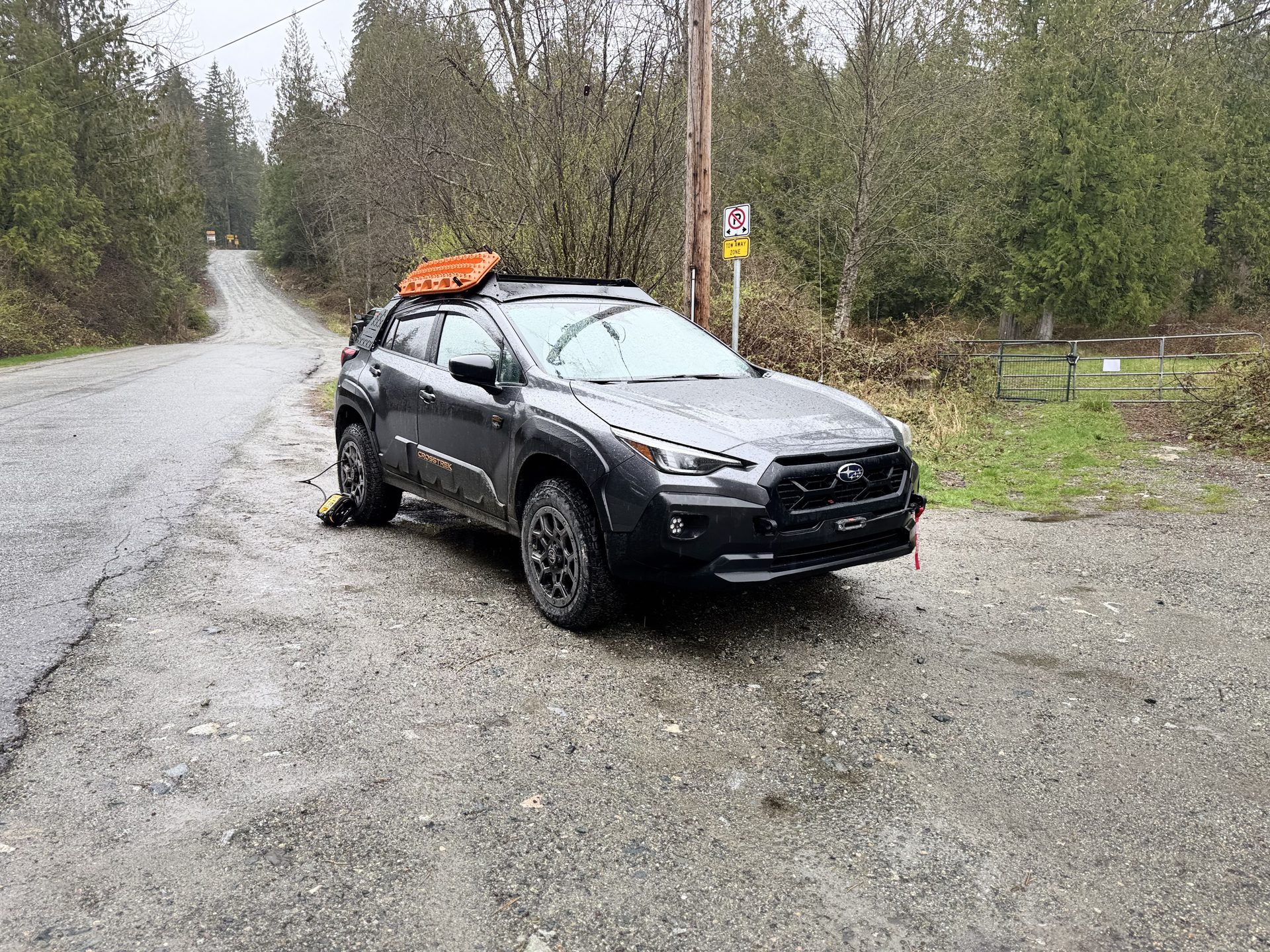 Crosstrek on a green summer forest trail